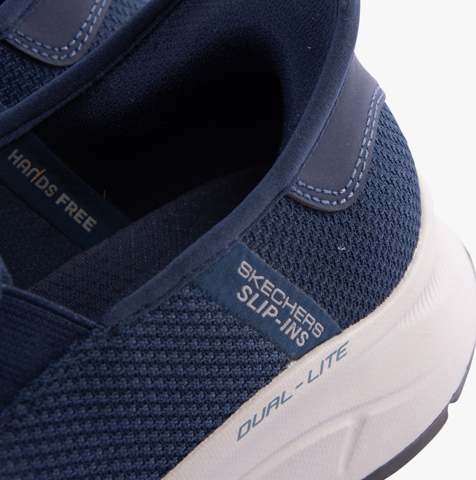 Skechers 232926/NVY EQUALIZER 5.0 - DRAYZE Mens Trainers Navy detail view of slip-on design and breathable mesh