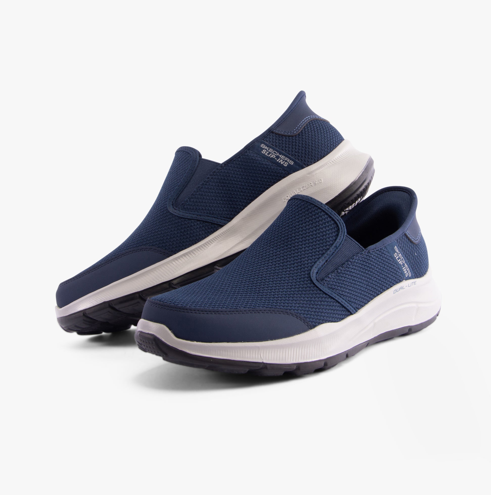Skechers 232926/NVY EQUALIZER 5.0 - DRAYZE Mens Trainers Navy side view with slip-on design and breathable mesh upper.