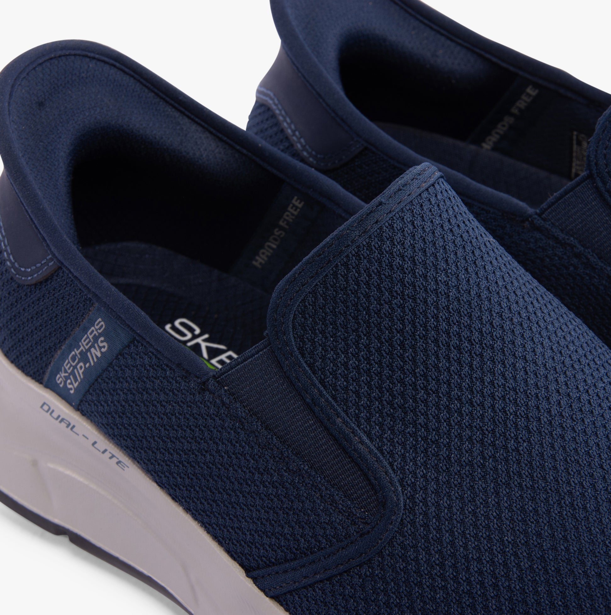 Skechers 232926/NVY EQUALIZER 5.0 - DRAYZE Mens Trainers Navy top detail view showcasing breathable mesh and slip-on design.