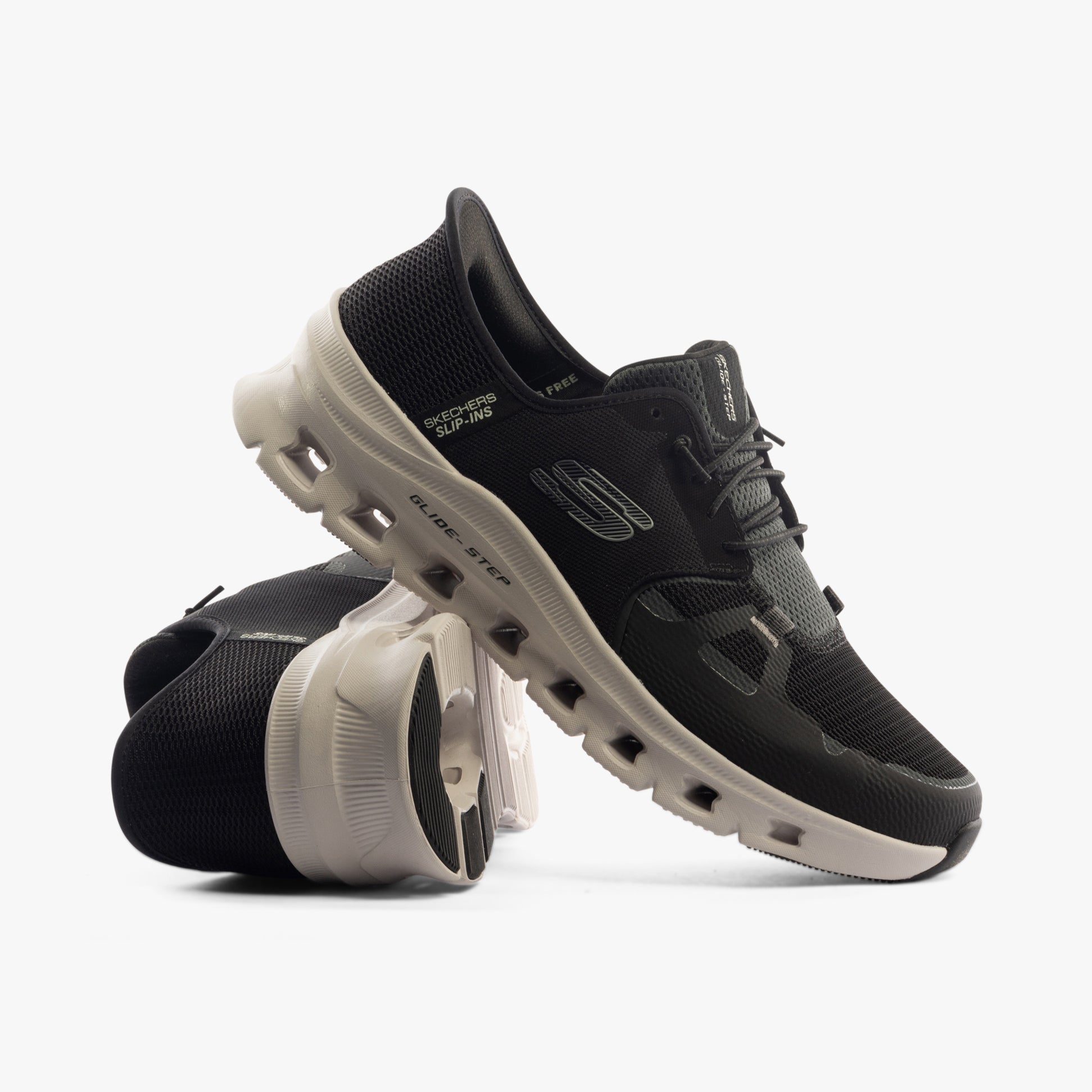 Side view of Skechers 232930/BLK GLIDE-STEP PRO Mens Trainers Black, featuring a breathable textile upper and rubber sole.