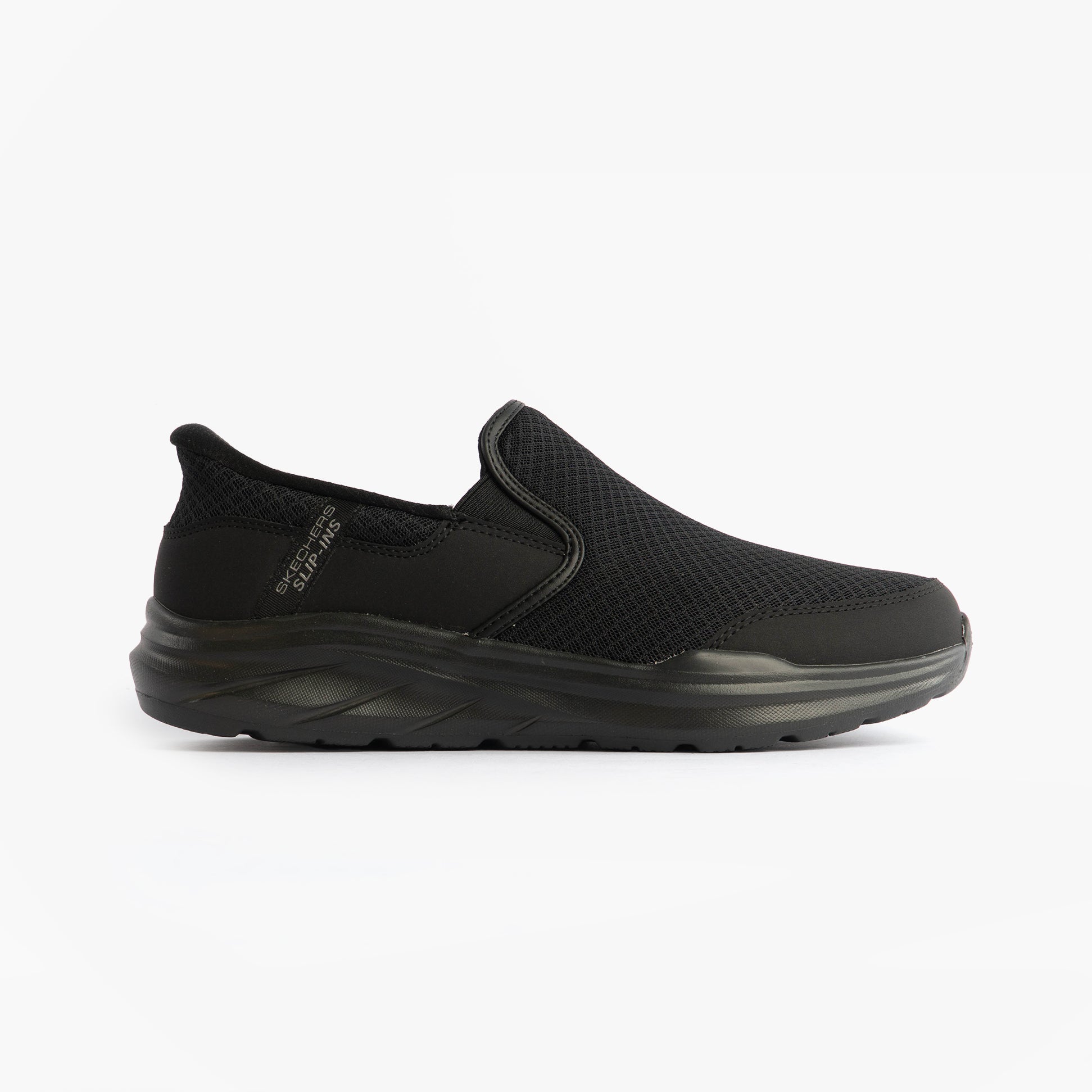 Skechers 233103/BBK EQUALIZER 6.0 - STOAVER Mens Trainers Black side view showing mesh upper and slip-on design.