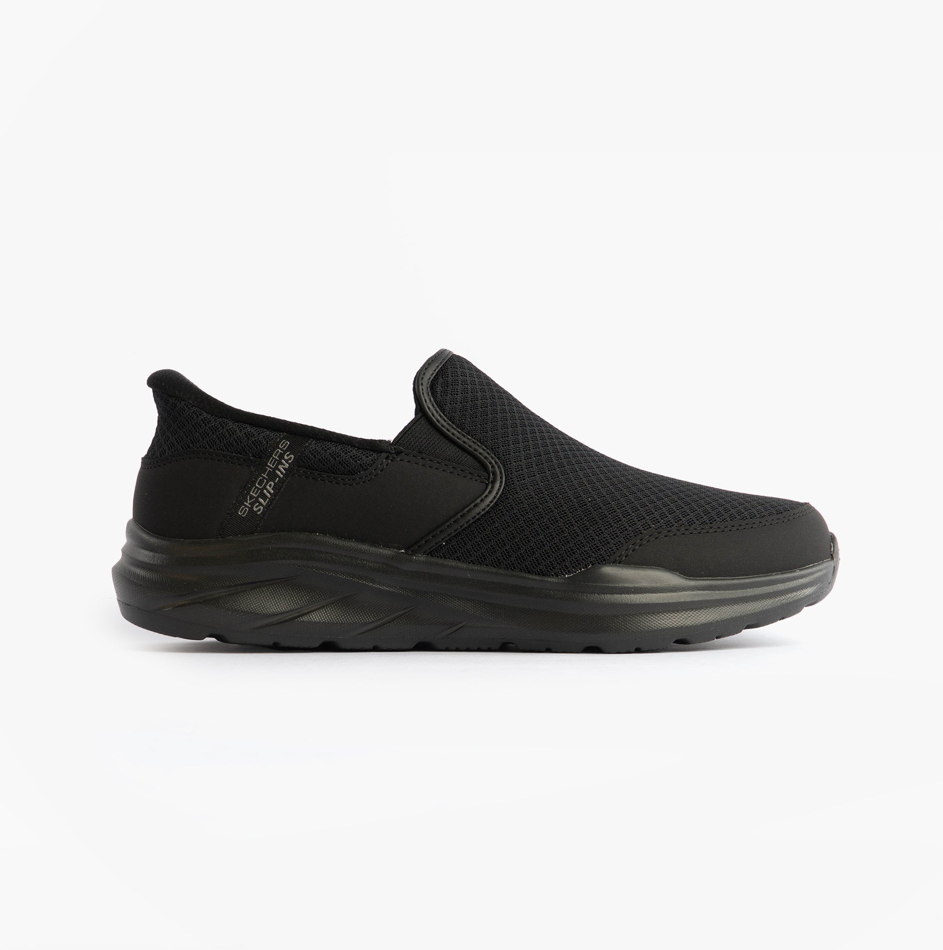 Skechers 233103/BBK EQUALIZER 6.0 - STOAVER Mens Trainers Black side view showing mesh upper and slip-on design.