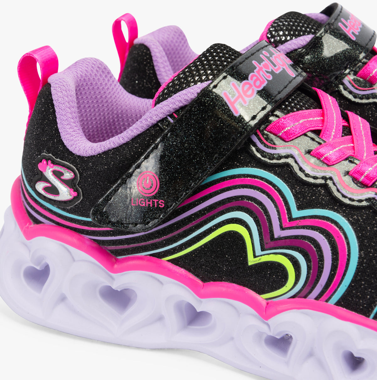 Skechers 302689L/BKMT HEART LIGHTS - RETRO HEARTS Girls Trainers Black/Multi close-up detail view of shoe light-up feature.
