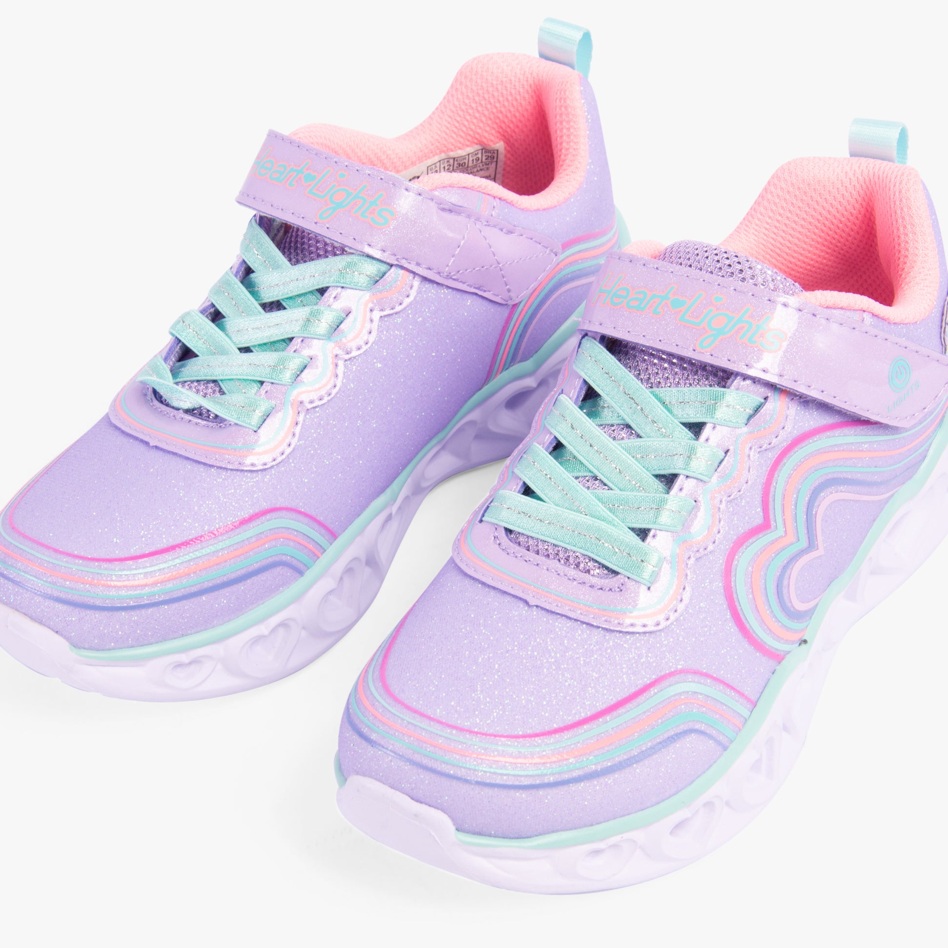 Skechers 302689L/LVMT HEART LIGHTS - RETRO HEARTS Girls Trainers Lavender/Multi front view with glitter finish and pastel colors.