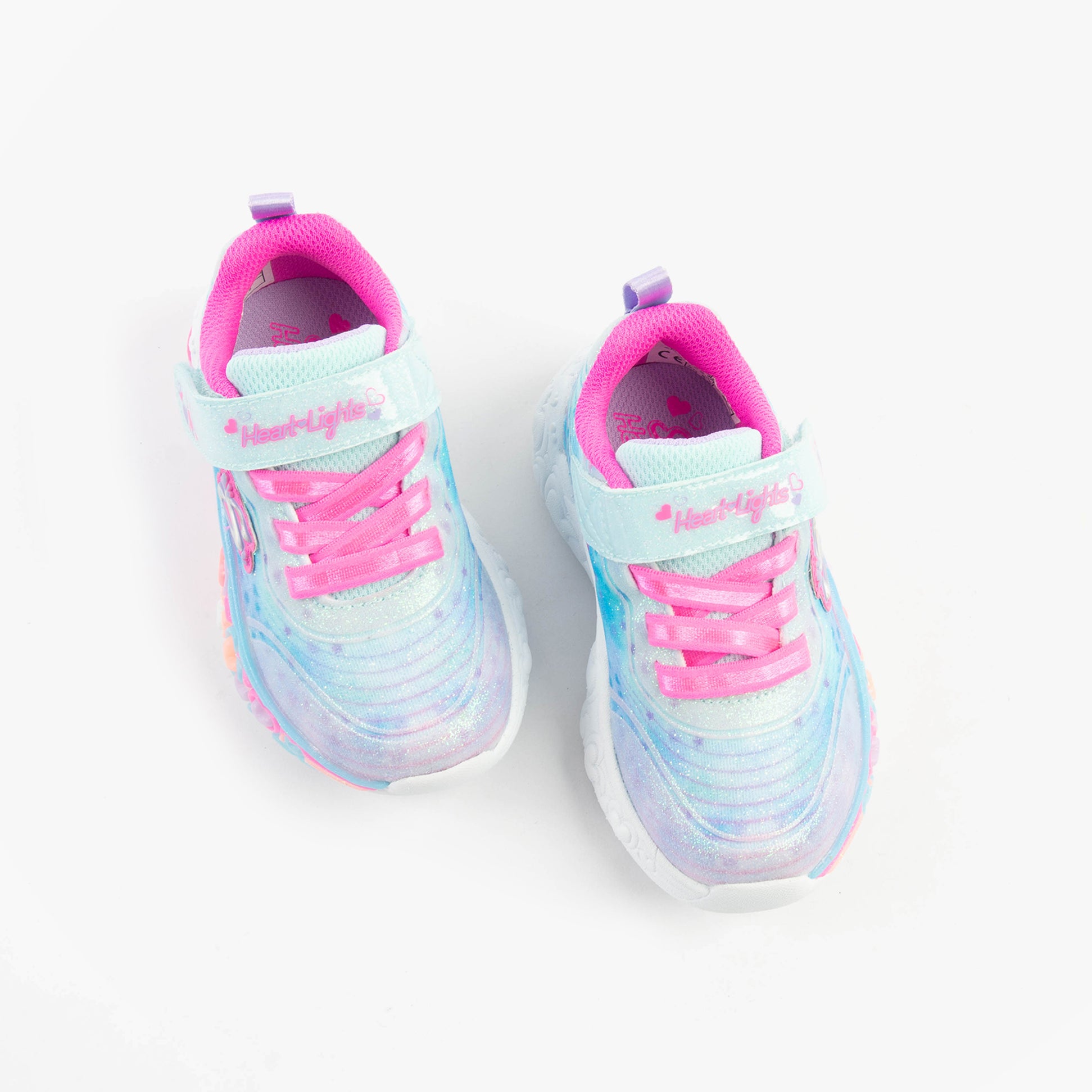 Skechers 302696N/LBMT S-LIGHTS: ETERNAL HEART LIGHTS Girls Trainers Light Blue/Multi top view of shoes with pink accents.