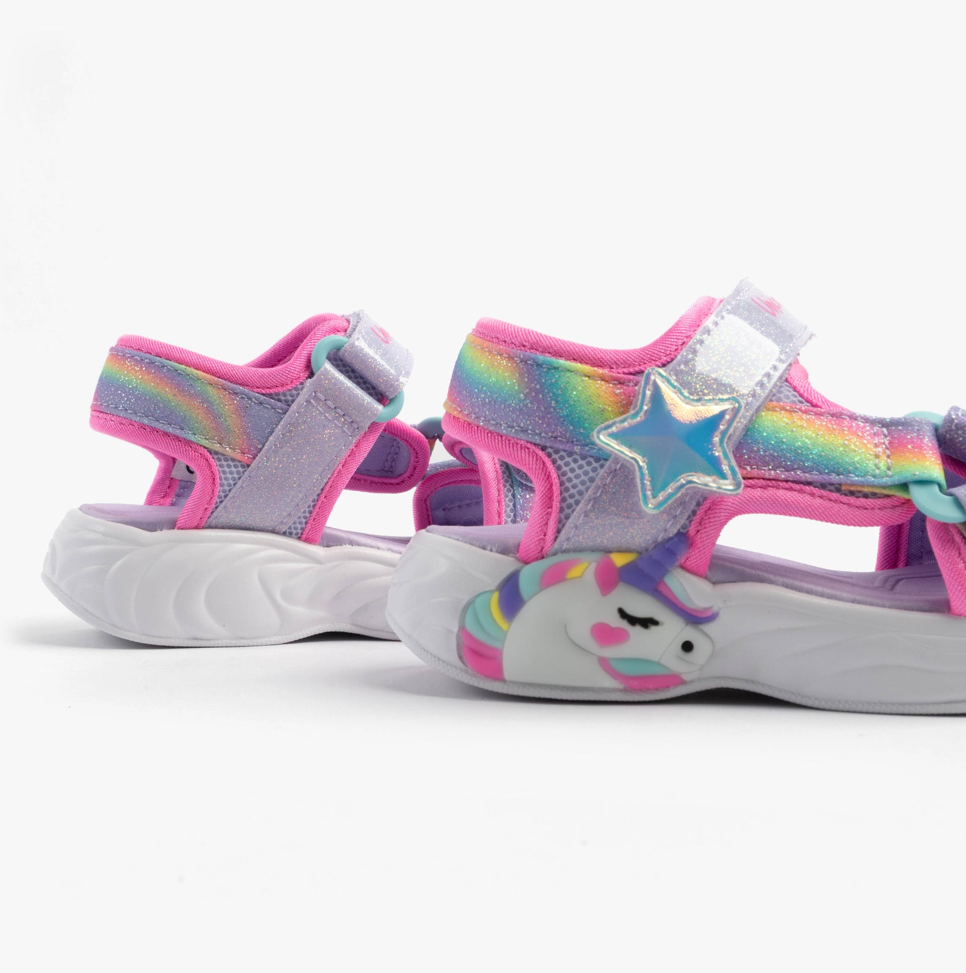 Skechers 303107N/LVMT UNICORN DREAMS SANDAL - DREAMY Girls Sandals Lavender Multi side view featuring unicorn design and star detail.