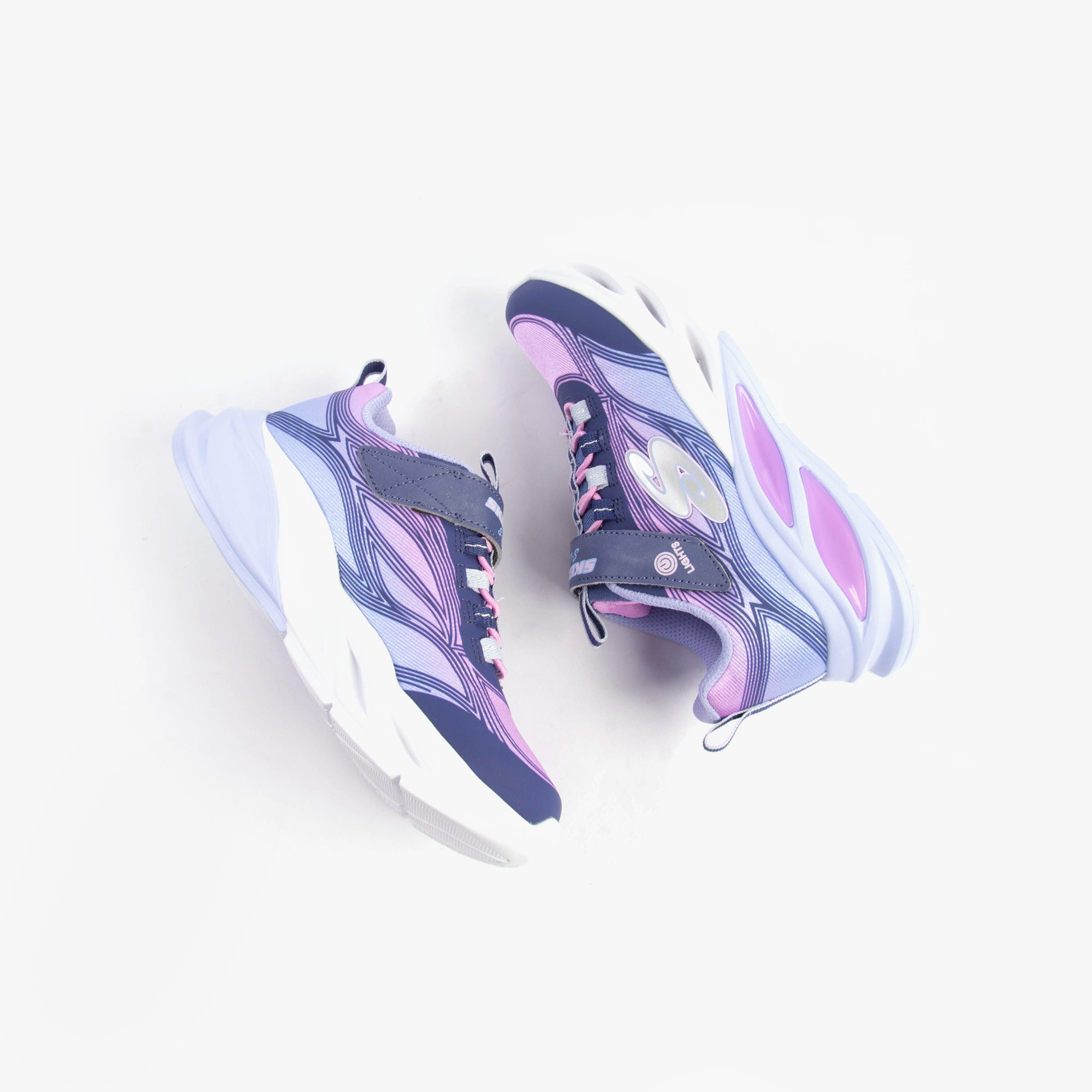 Skechers 303712L/NVMT COSMIC GLOW Girls Trainers Navy Multi side view, featuring bungee stretch laces and light up design.