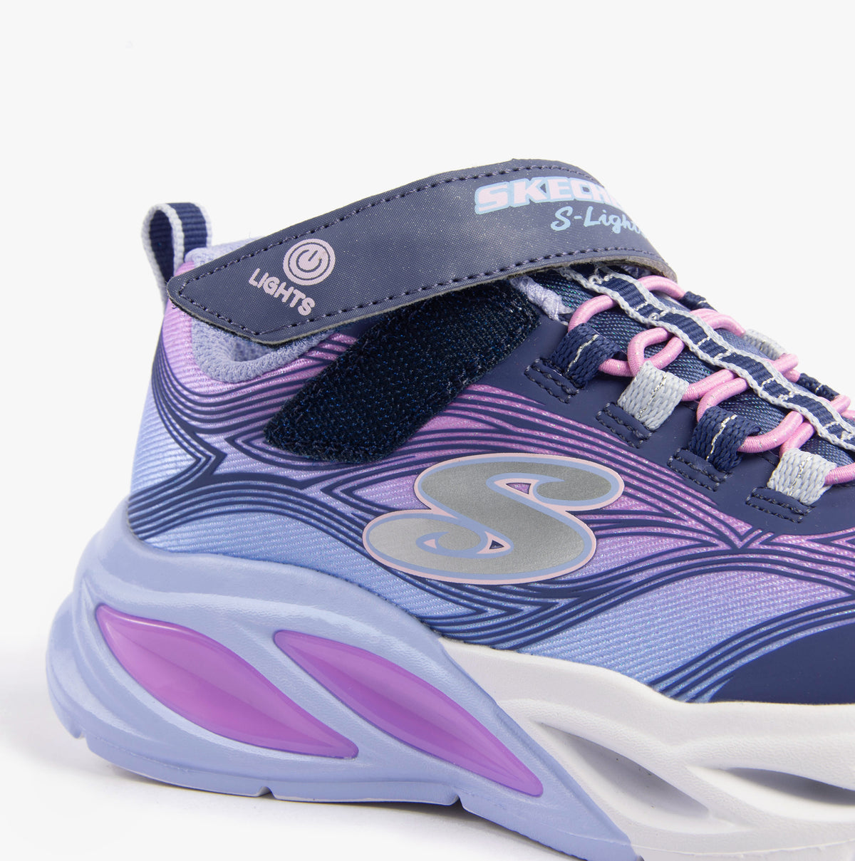 Skechers 303712L/NVMT COSMIC GLOW Girls Trainers Navy Multi side view showing light-up features and detailed design.
