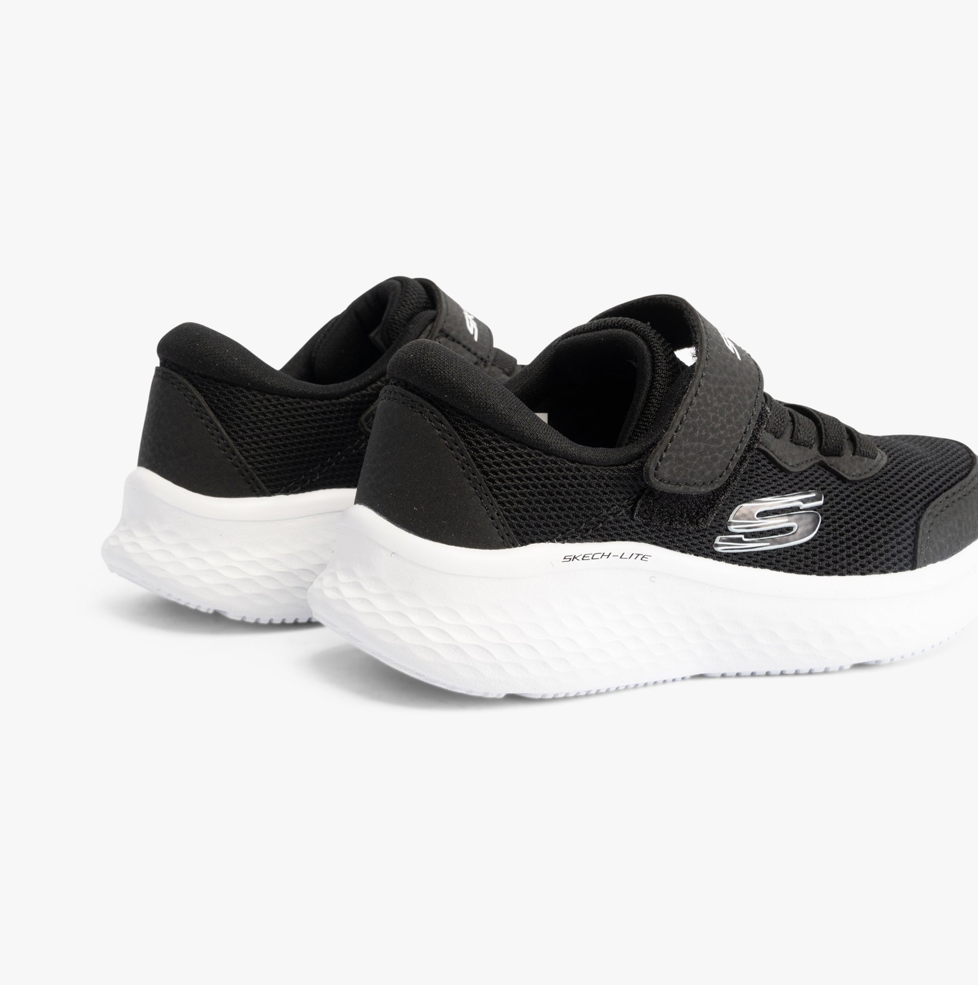 Skechers 303934L/BLK SKECH-LITE PRO Girls Trainers Black rear view, showcasing the synthetic upper and rubber sole.