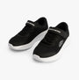 Skechers 303934L/BLK SKECH-LITE PRO Girls Trainers Black, side view showcasing synthetic upper and lace-up closure.