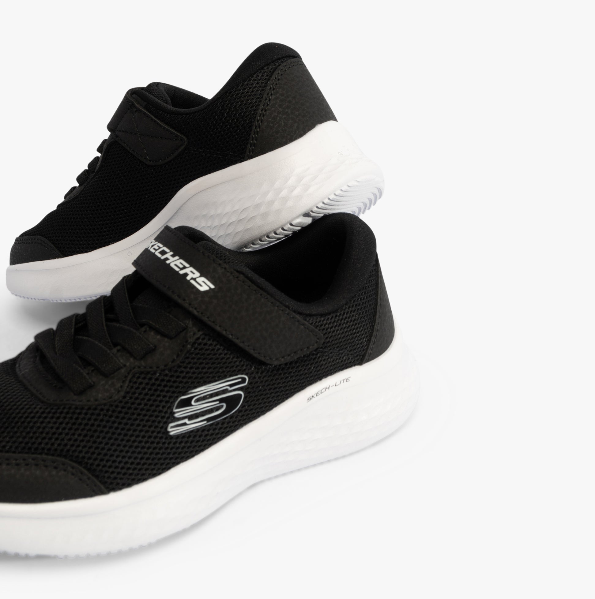 Skechers 303934L/BLK SKECH-LITE PRO Girls Trainers Black side and rear view showcasing lace-up design and synthetic upper.