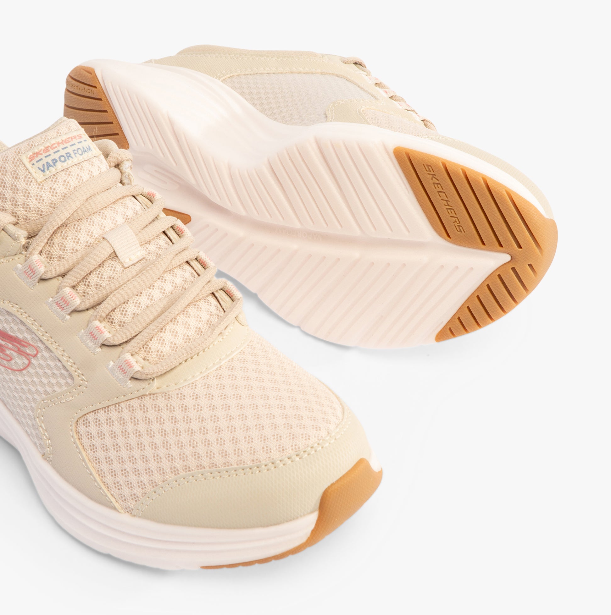 Skechers 303937L/NAT VAPOR FOAM - LASTING MOMENT Girls Trainers Natural front and angle view, showing details of the lace-up design and sole.