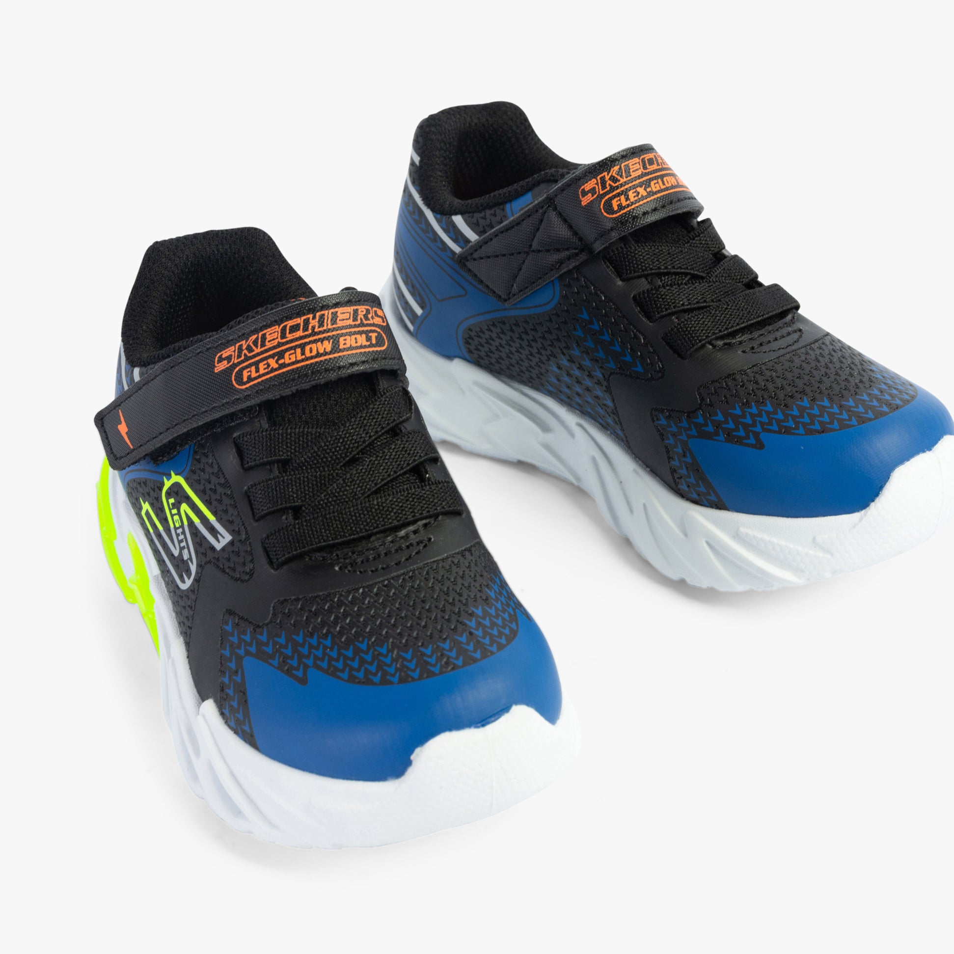 Skechers 400138N/BKBL FLEX-GLOW BOLT Boys Trainers Black/Blue side view showing lightweight design and comfort features.