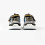Skechers 400139N/BKSL S LIGHTS FLEX-GLOW ULTRA Boys Trainers Black/Silver front view with lace-up closure and comfortable design.