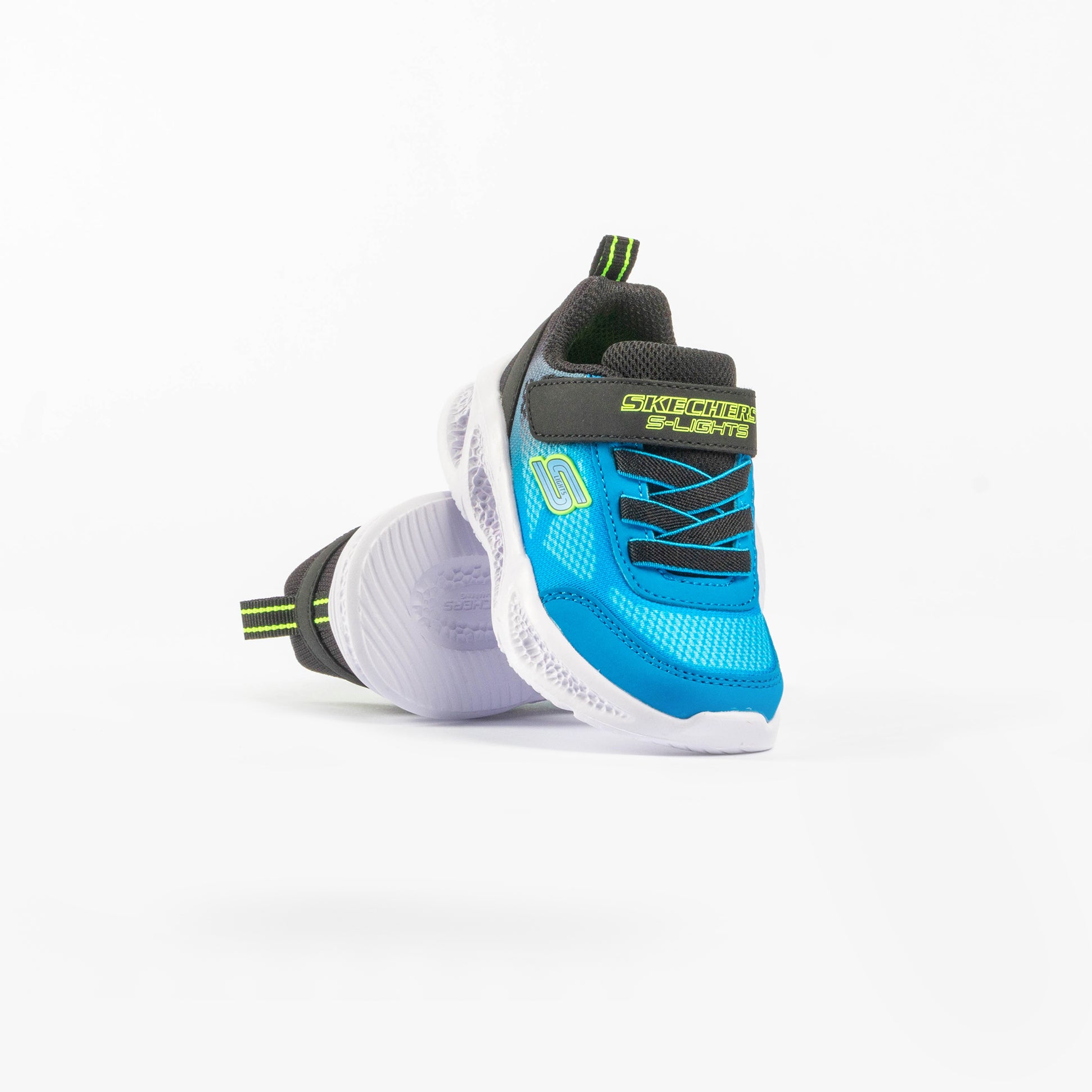 Skechers 401495N/BKBL METEOR-LIGHTS-KRENDO Boys Trainers Black Blue side view, showcasing synthetic upper and rubber sole.