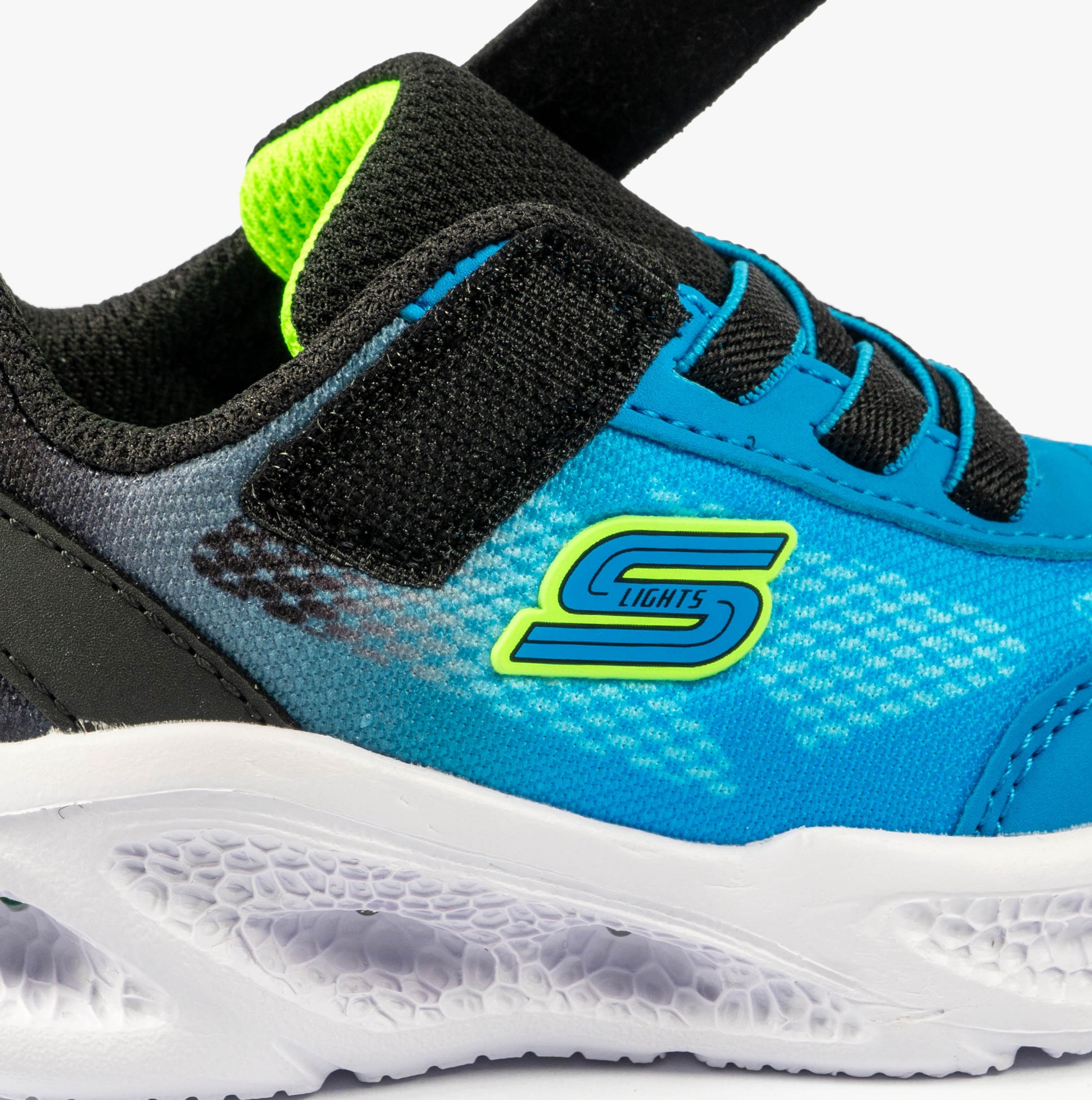 Skechers 401495N/BKBL METEOR-LIGHTS-KRENDO Boys Trainers Black Blue detail view of shoe upper