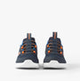 Skechers 403822L/NVBL BOUNDER - BRISK-BURST Boys Trainers Navy front view showcasing stretch laces and low-top design.