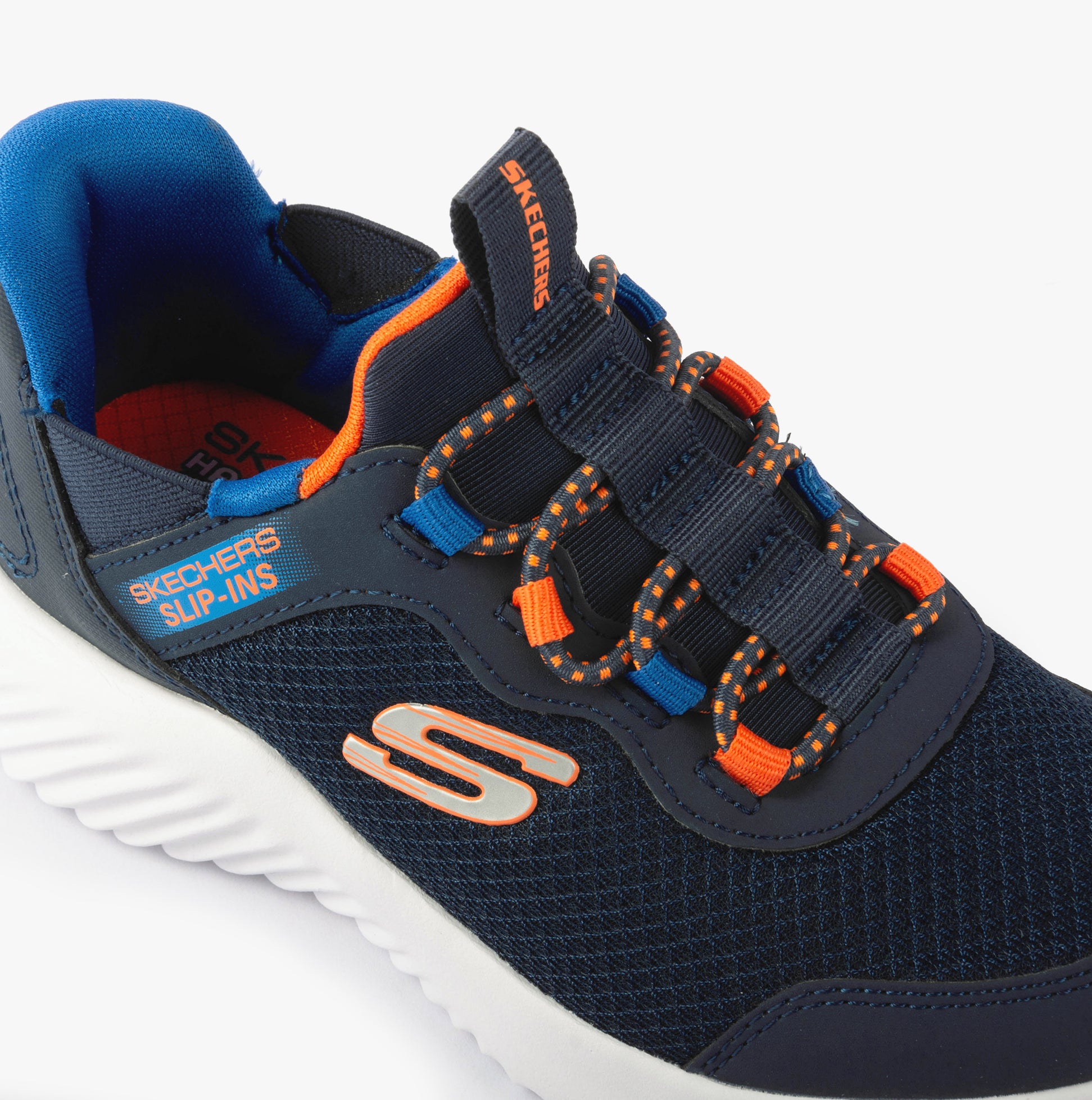 Skechers 403822L/NVBL BOUNDER - BRISK-BURST Boys Trainers Navy side view showcasing stretch laces detail.