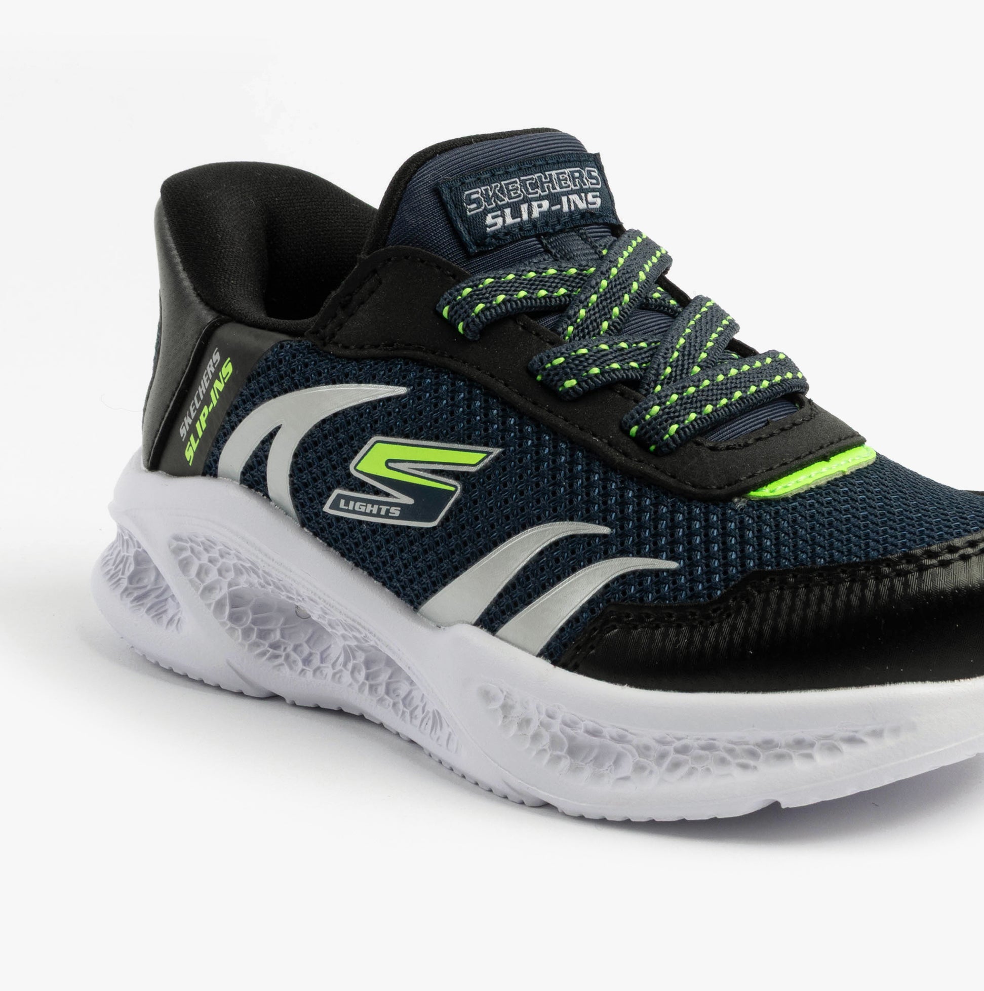 Skechers 403848N/NVBK METEOR-LIGHTS-BRISK-BEAMS Boys Trainers Navy/Black side view featuring laces and mesh upper.