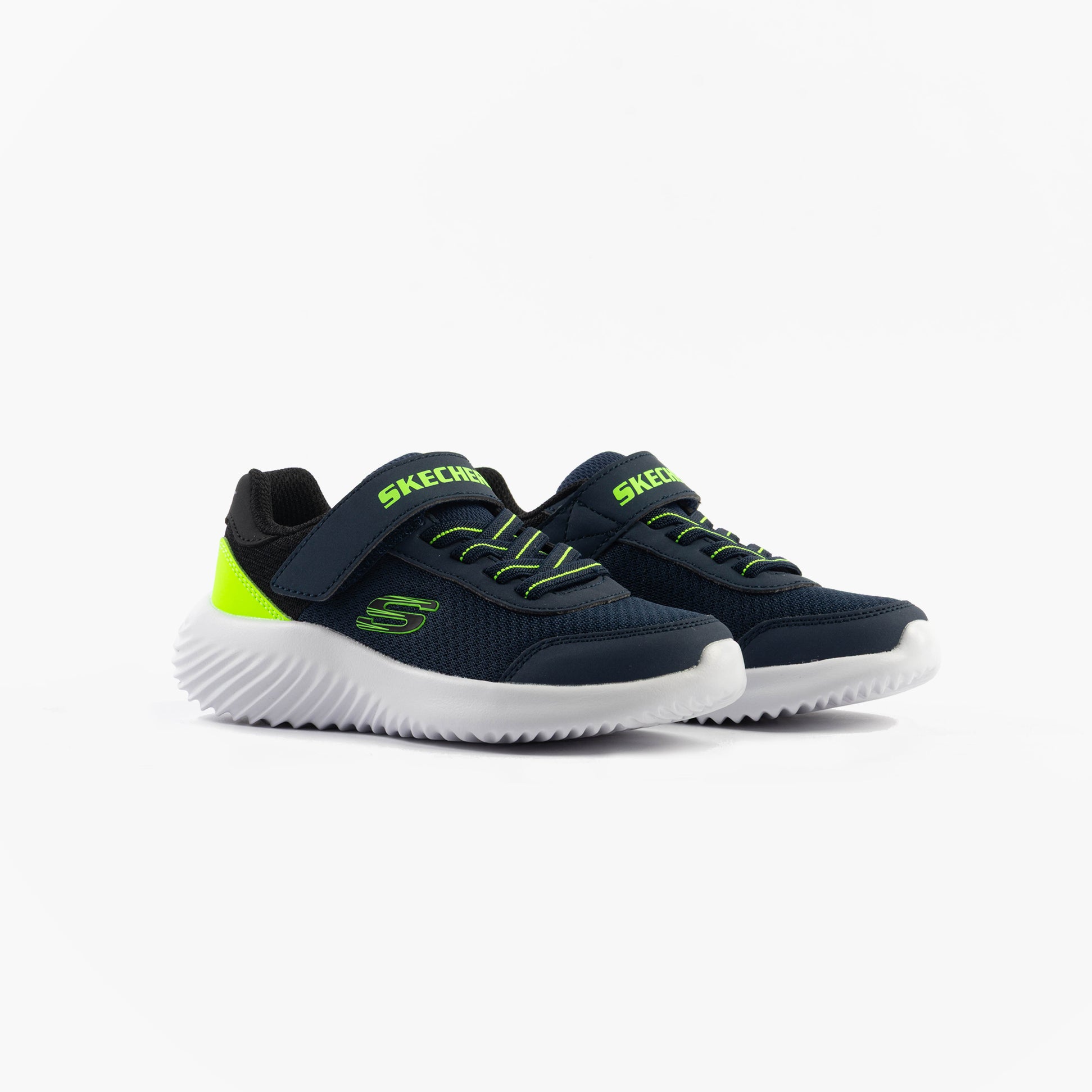 Skechers 403908L/NVLM BOUNDER - TREKZIC Boys Trainers Navy/Lime side view highlighting comfort and lightweight design.