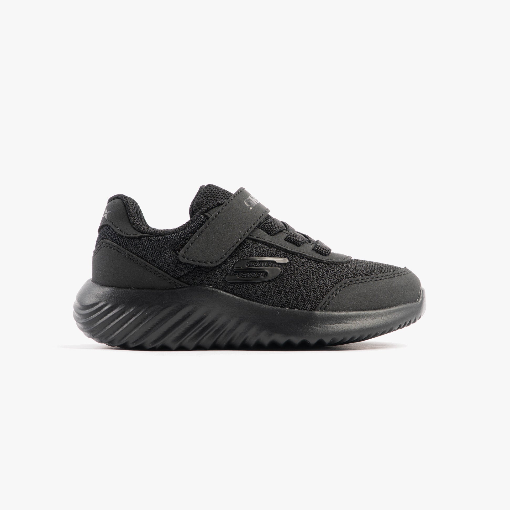 Skechers 403908N/BBK BOUNDER - TREZIC Boys Trainers Black side view, lightweight casual trainers with synthetic upper.
