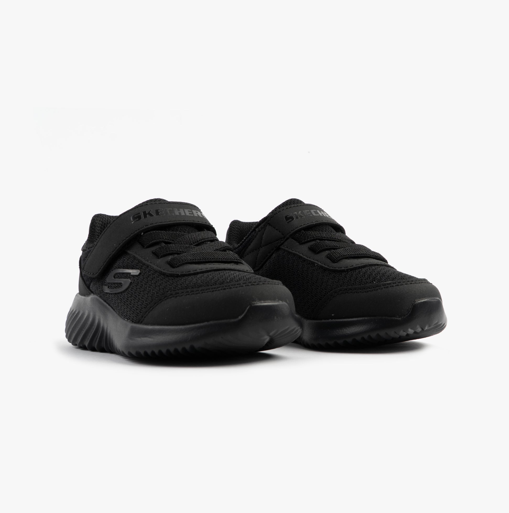 Skechers 403908N/BBK BOUNDER - TREZIC Boys Trainers Black front view showcasing lightweight design and comfortable fit.