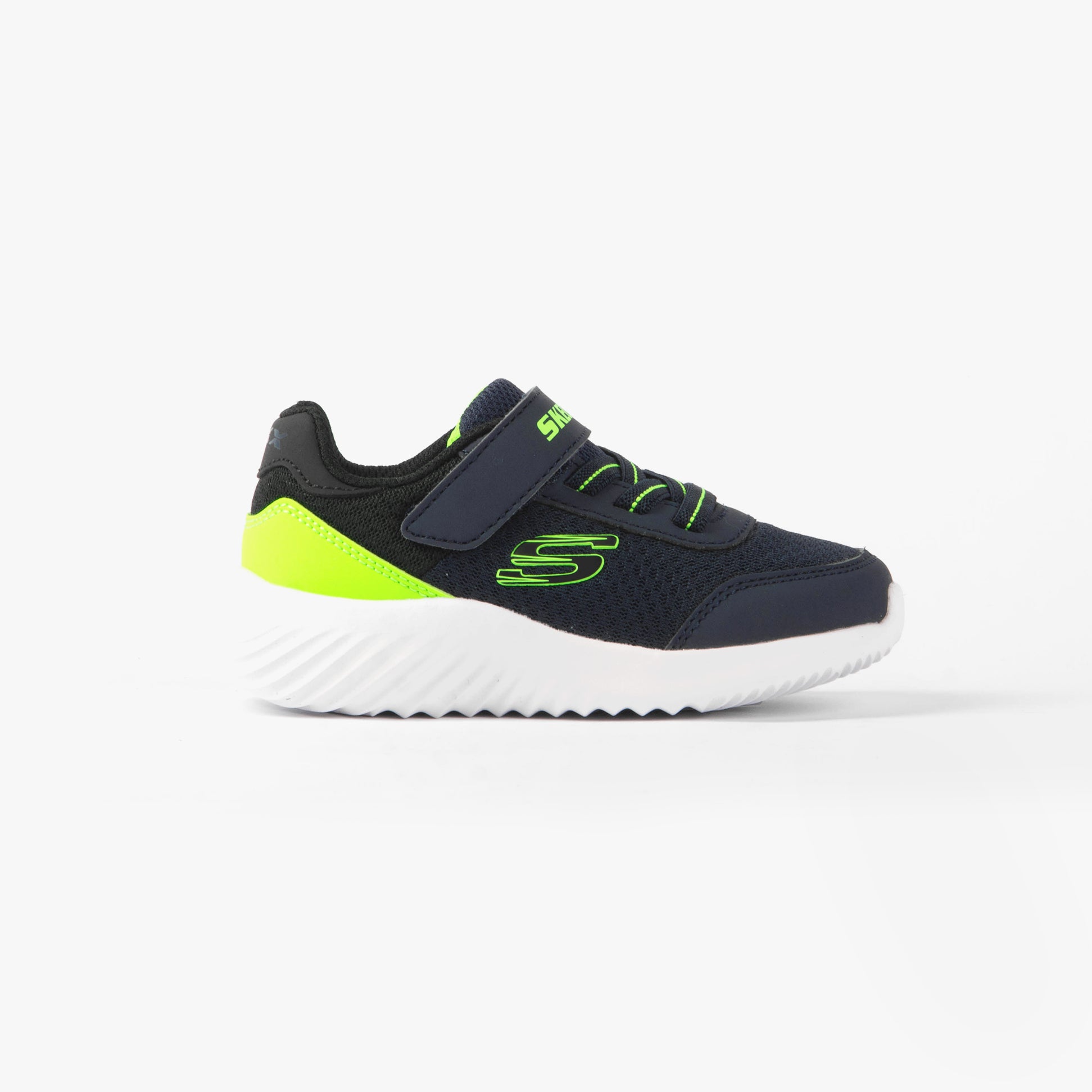 Skechers 403908N/NVLM BOUNDER - TREZIC Boys Trainers Navy/Lime side view with synthetic upper and rubber sole.