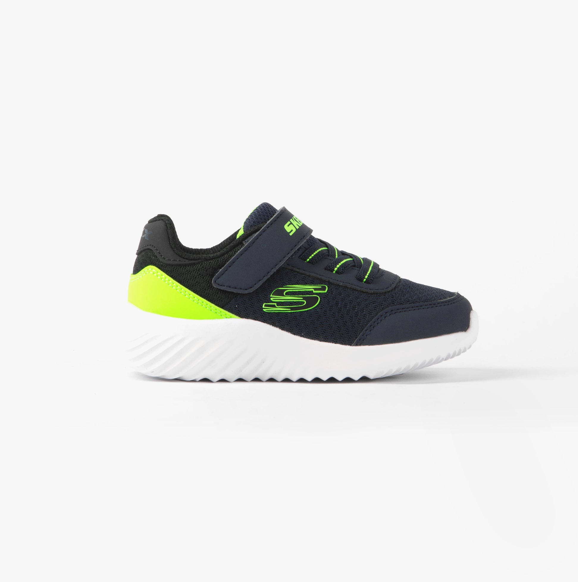 Skechers 403908N/NVLM BOUNDER - TREZIC Boys Trainers Navy/Lime side view with synthetic upper and rubber sole.