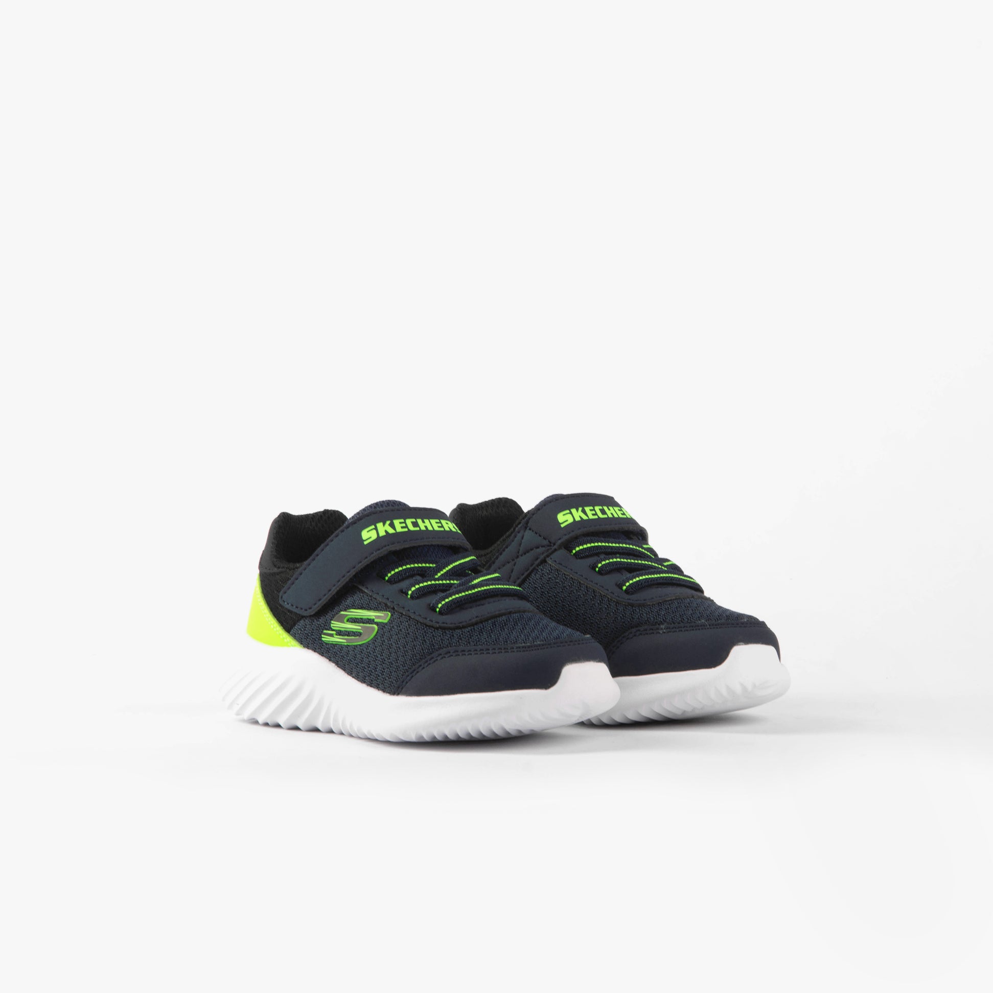 Skechers 403908N/NVLM BOUNDER - TREZIC Boys Trainers Navy/Lime front view showcasing lightweight design and touch fastening.