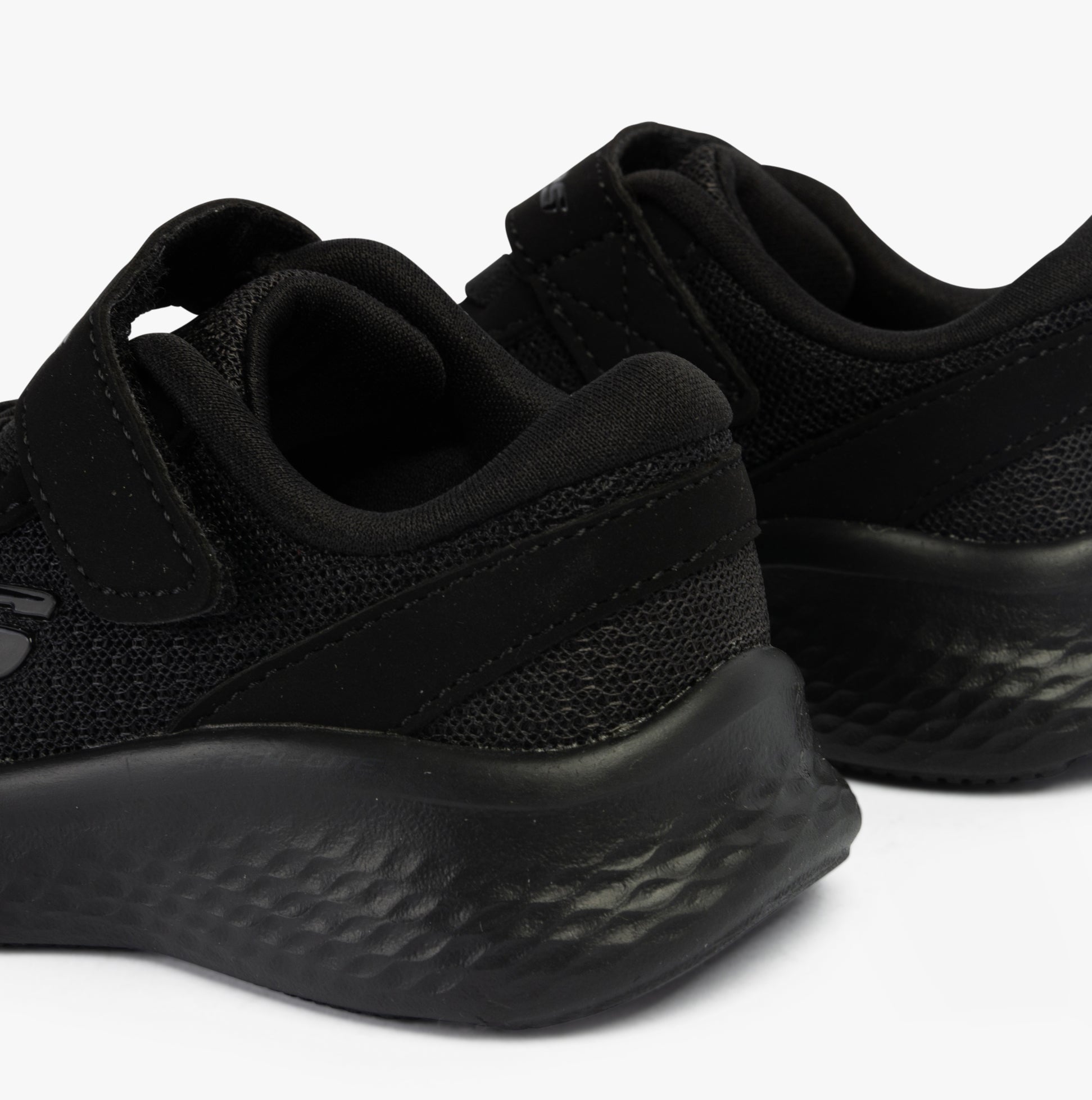 Skechers 404015N/BBK SKECH-LITE PRO - SPRINT SURGE Boys Trainers Black rear view showing synthetic and mesh upper.