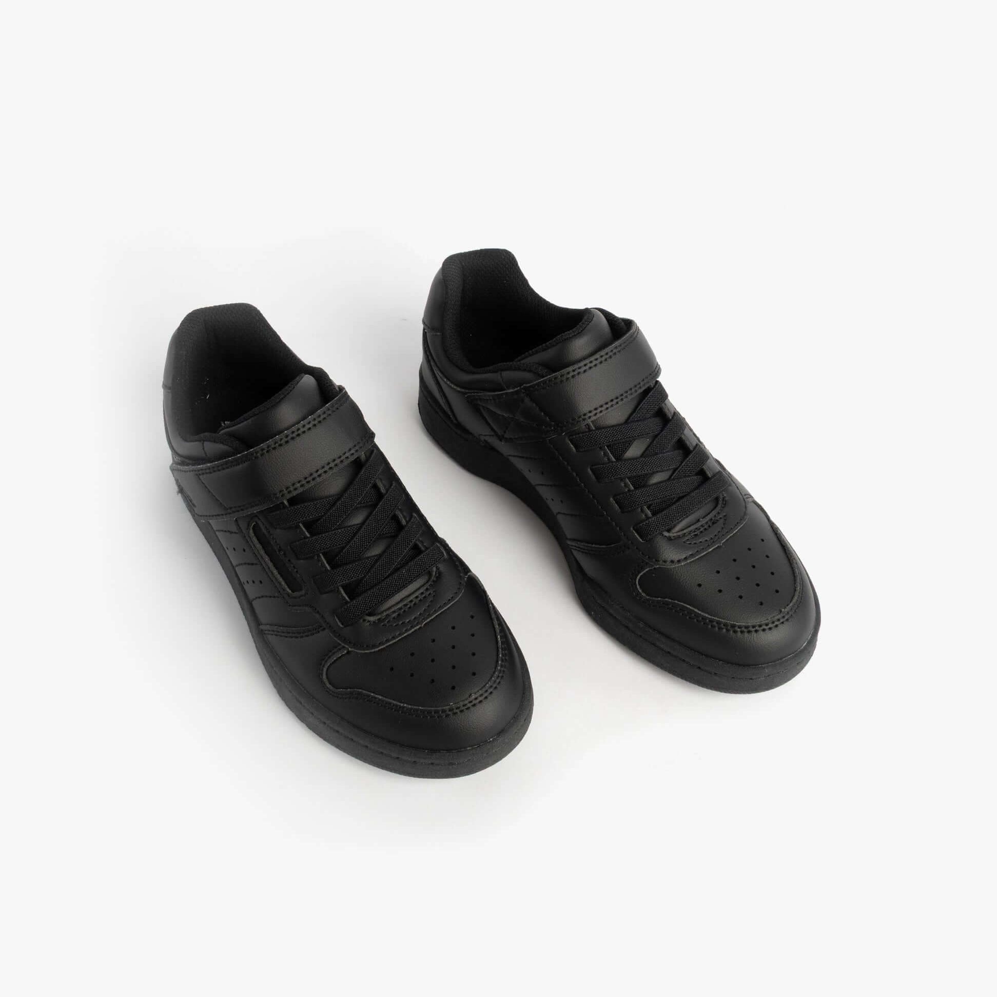 Skechers 405638L/BBK QUICK STREET Boys School Trainers Black top view showing sleek synthetic design and lace-up closure.