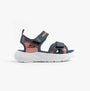 Skechers 407034L/NVOR MICROSPEC - SPLASH Boys Sandals Navy/Orange side view with synthetic upper and rubber sole.