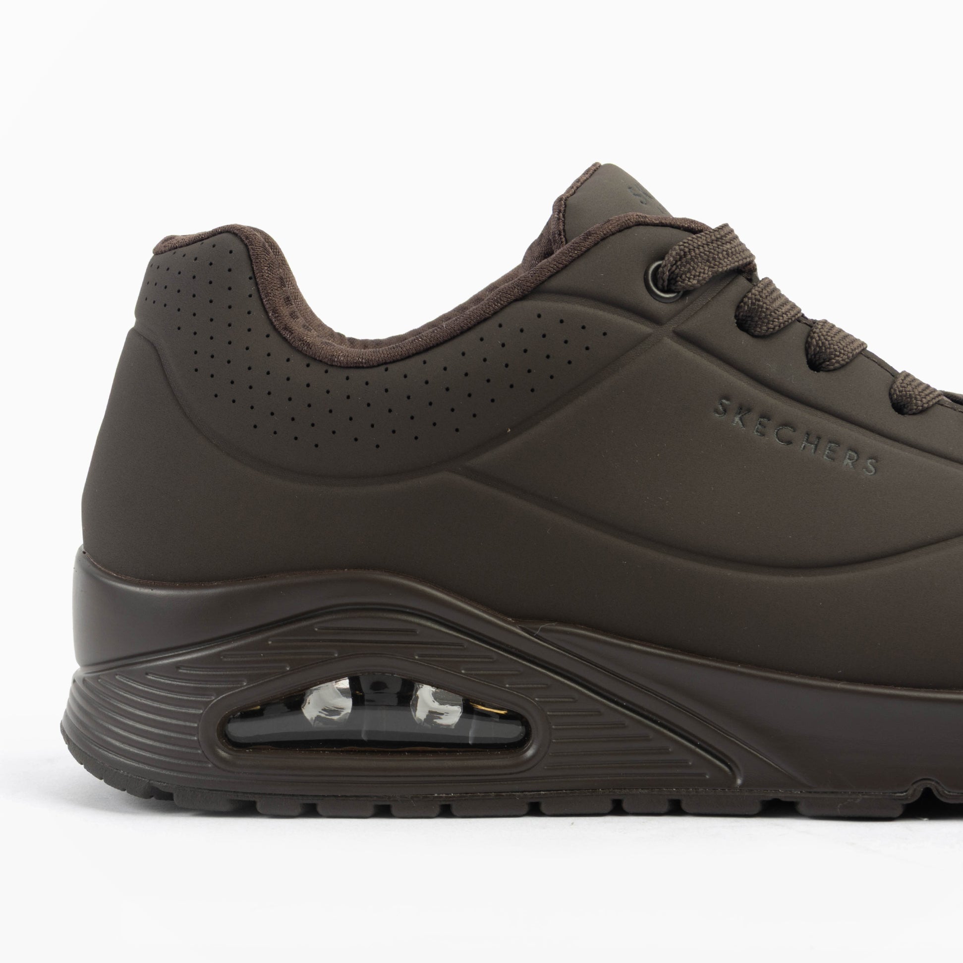 Skechers 52458/CHOC UNO - STAND ON AIR Mens Trainers Chocolate side view, showing trainer upper and air-cooled memory foam.