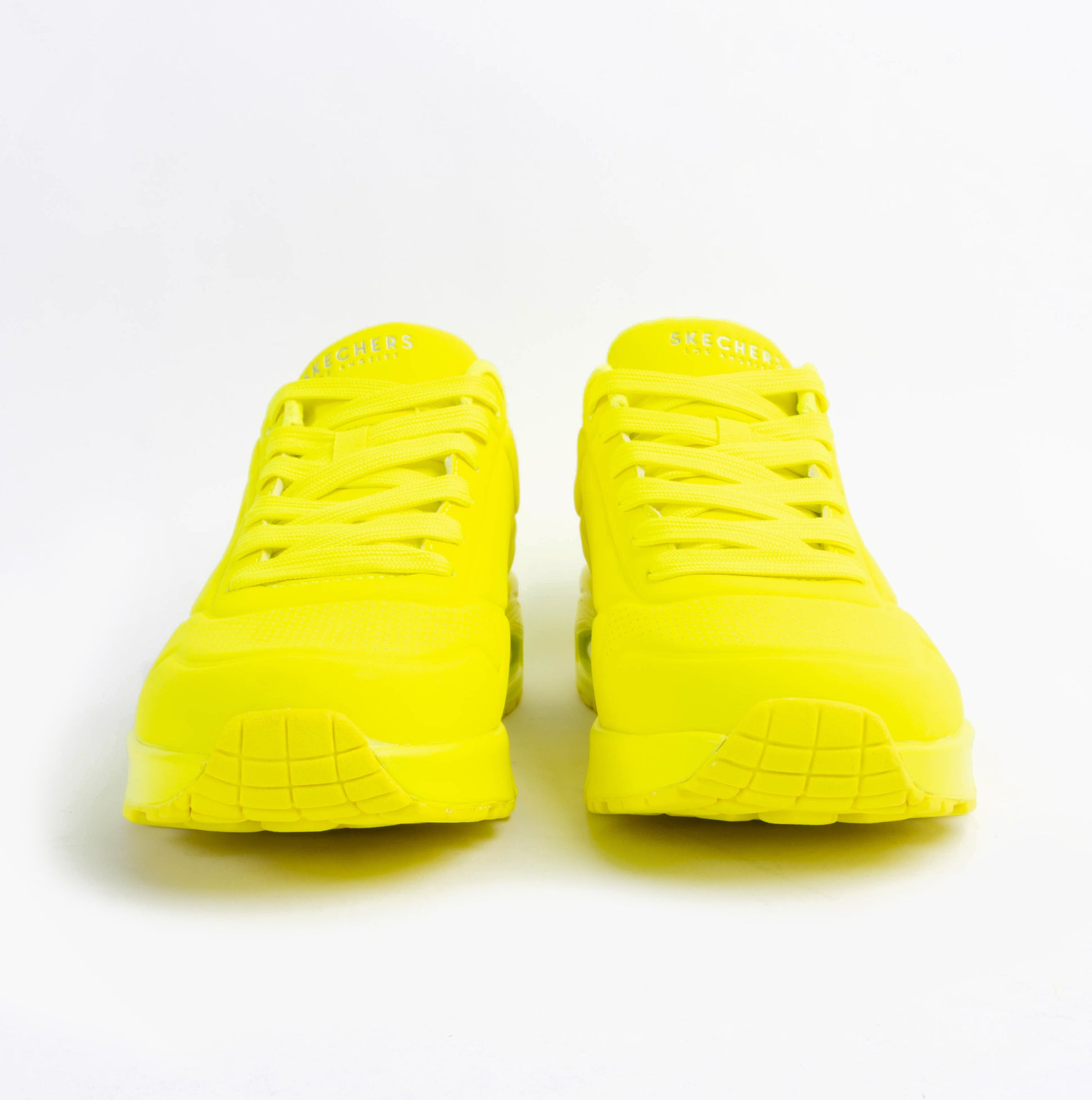 Skechers 52458/LIME UNO - STAND ON AIR Mens Trainers Lime front view showcasing vibrant yellow color and lace-up design.