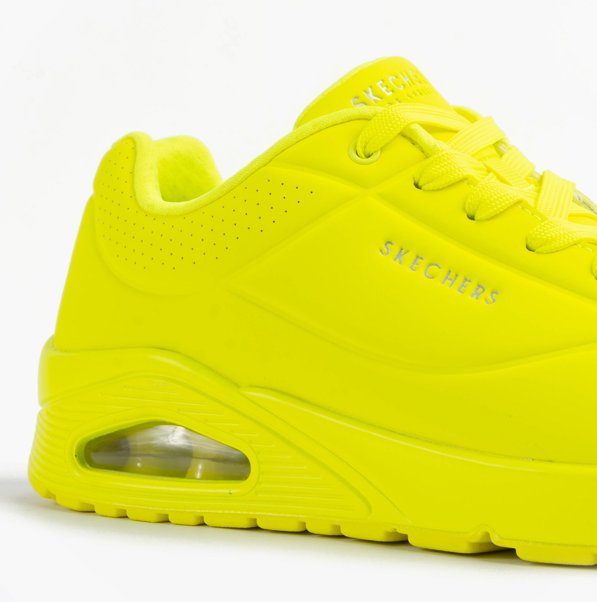 Skechers 52458/LIME UNO - STAND ON AIR Mens Trainers Lime side view showcasing bright lime synthetic leather upper.