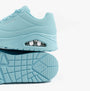 Skechers 73690/LTBL UNO - STAND ON AIR Womens Trainers Light Blue side view showing air cushioning and rubber sole detail.