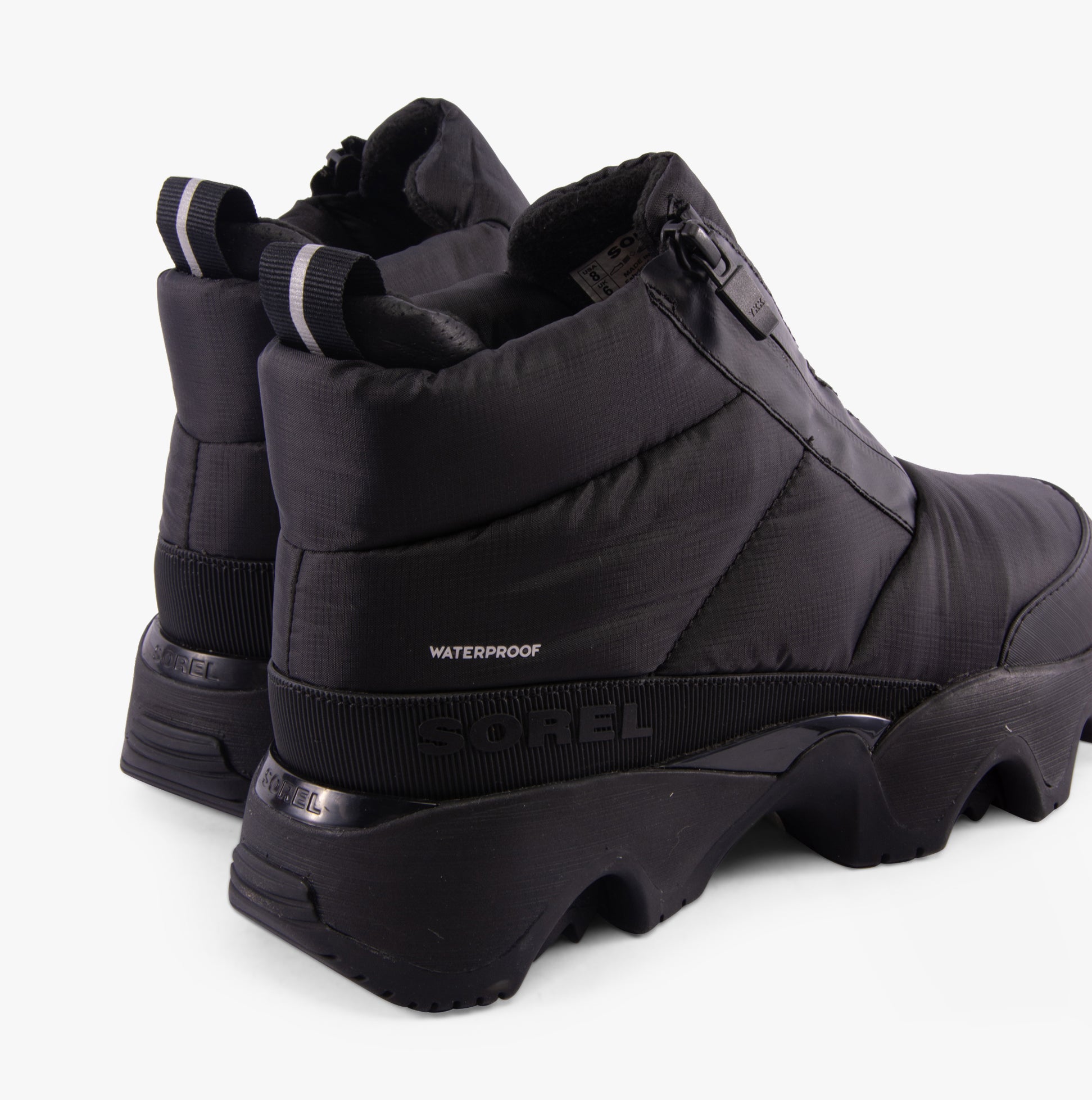 Sorel KINETIC IMPACT PUFFY ZIP Womens Winter Boots Black back view highlighting waterproof design.