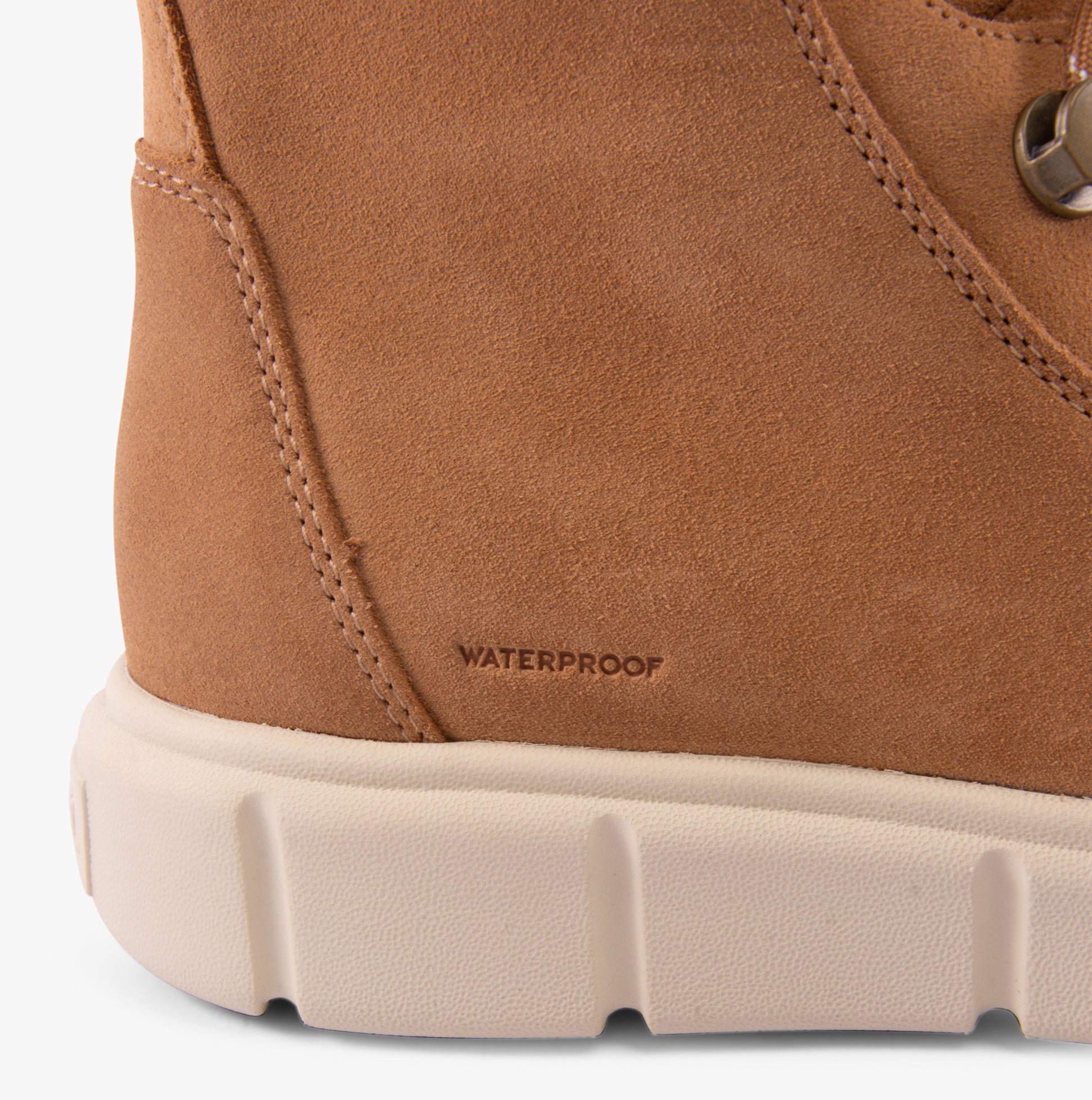 Sorel EXPLORER III JOAN Womens Winter Boots Brown detail view showing waterproof material and rubber sole.