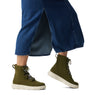 Sorel EXPLORER III JOAN Womens Winter Boots Green side view on model's feet with denim skirt