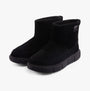 Sorel EXPLORER III SLIP-ON Womens Winter Boots Black side view featuring suede upper and rubber sole.
