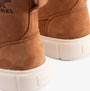 Detail view of Sorel EXPLORER III SLIP-ON Womens Winter Boots Brown showing suede upper and rubber sole.