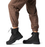 Sorel EXPLORER STRT LACE Womens Boots Black side view with model wearing checkered pants.