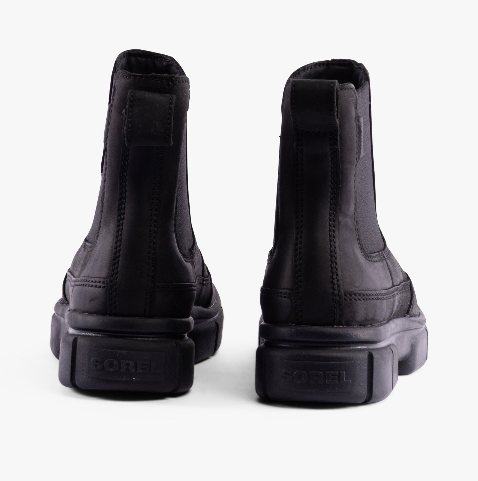 Sorel EXPLORER STRT Womens Chelsea Boots Black back view showcasing the sleek design and elasticated side panels.