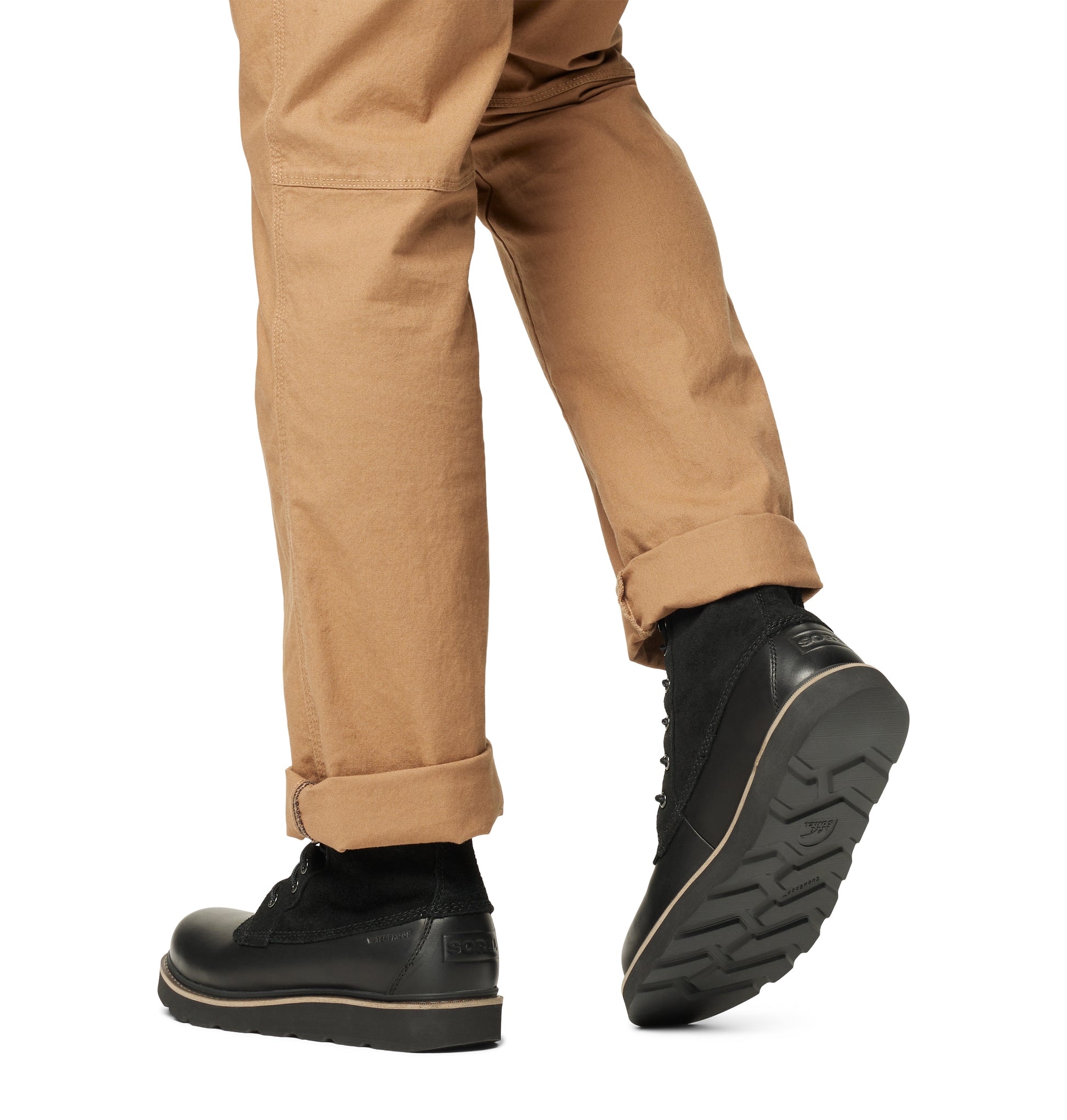 Sorel SLABTOWN 62' CARIBOU Mens Boots Black side view on model wearing khaki pants.