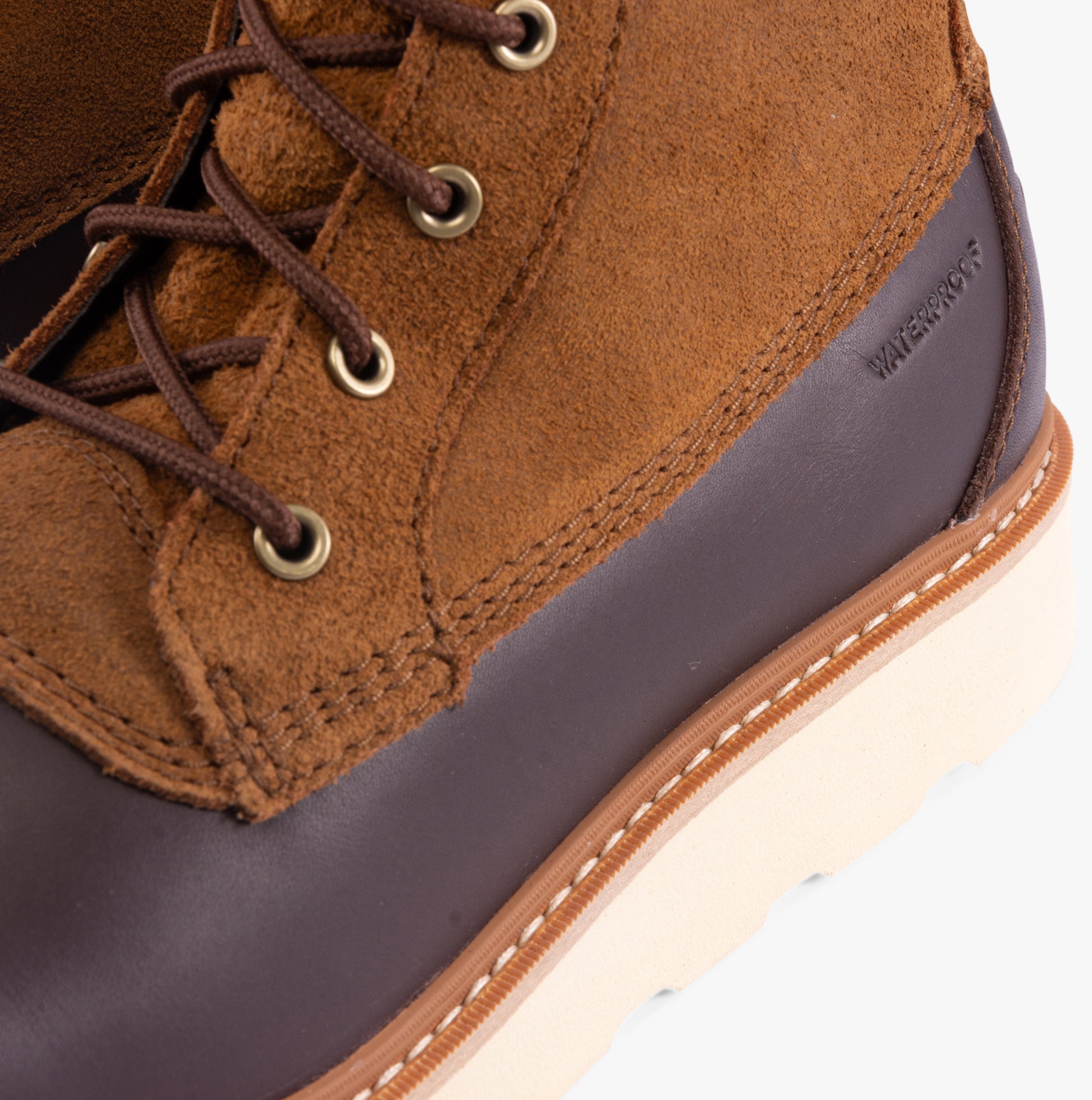 Detail view of Sorel SLABTOWN 62' CARIBOU Mens Boots Brown highlighting brown leather and suede materials.
