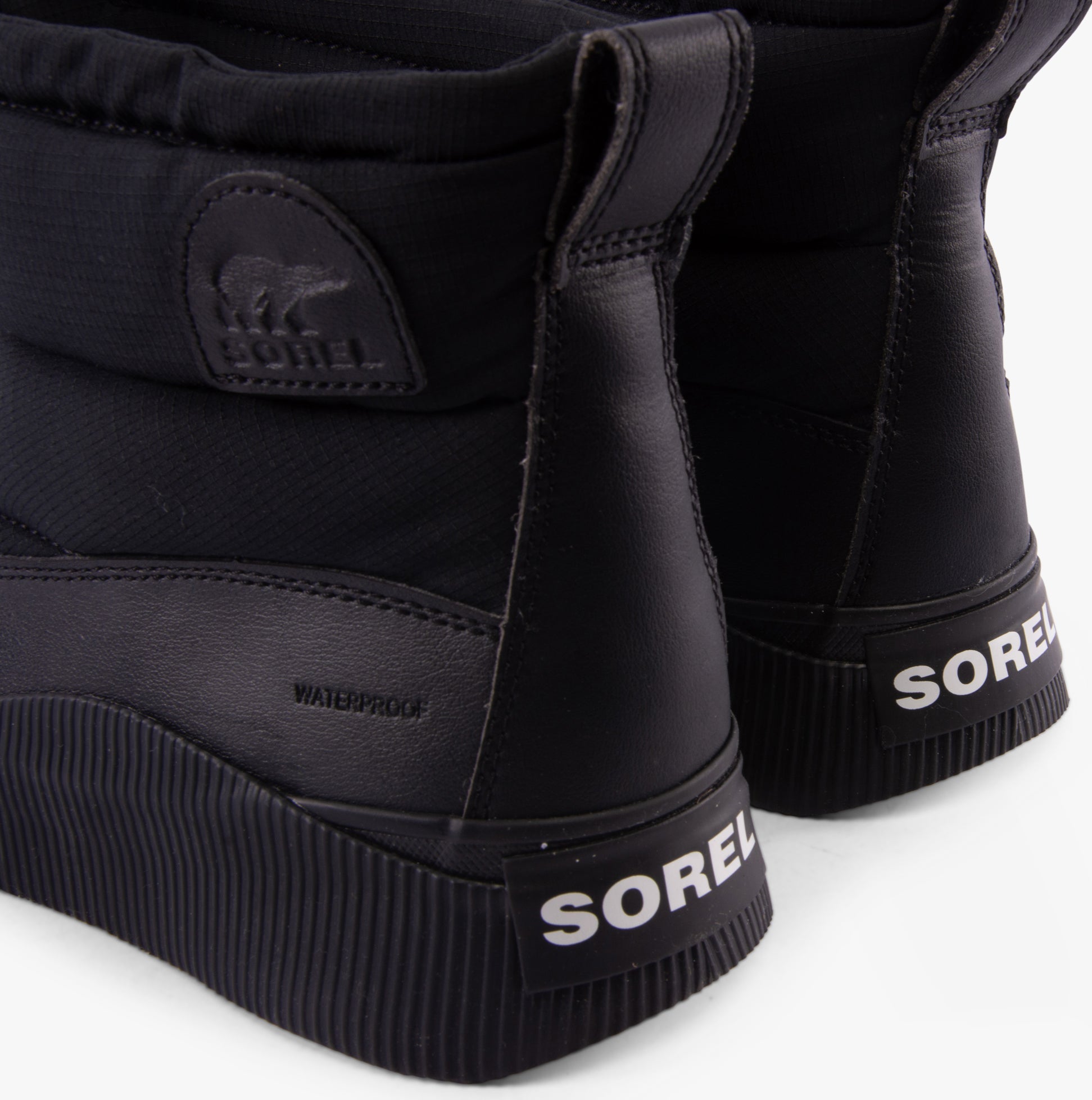 Sorel OUT N ABOUT IV PUFFY Womens Winter Boots Black rear view showing waterproof features and branding.