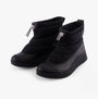 Sorel OUT N ABOUT IV PUFFY Womens Winter Boots Black side view showcasing waterproof ankle design and comfort features.