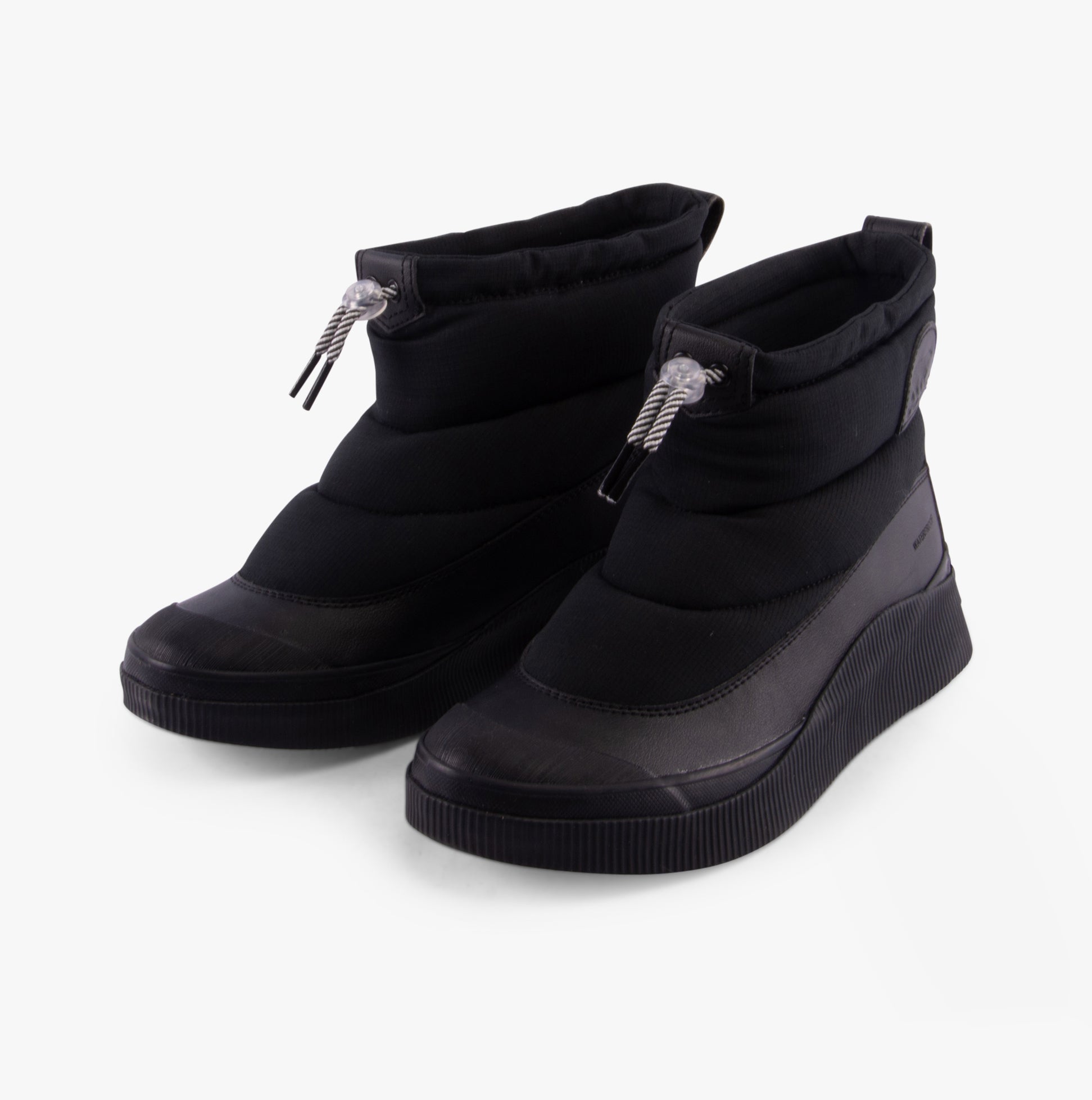 Sorel OUT N ABOUT IV PUFFY Womens Winter Boots Black side view showcasing waterproof ankle design and comfort features.