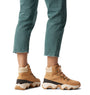 Sorel KINETIC IMPACT CONQUEST PLUS Womens Winter Boots Brown side view worn with jeans.