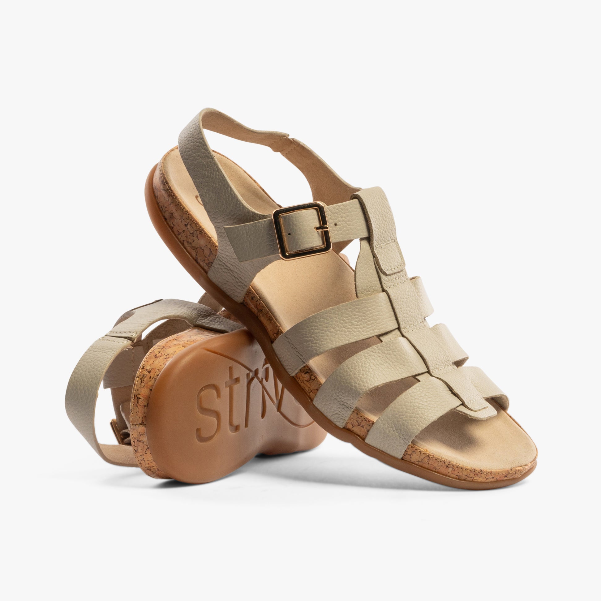 Strive CRISTAL Womens Sandals Latte side view showcasing leather upper and buckle closure.